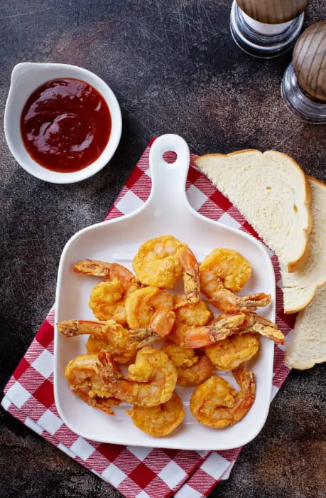 Receita de camarão empanado na air fryer.